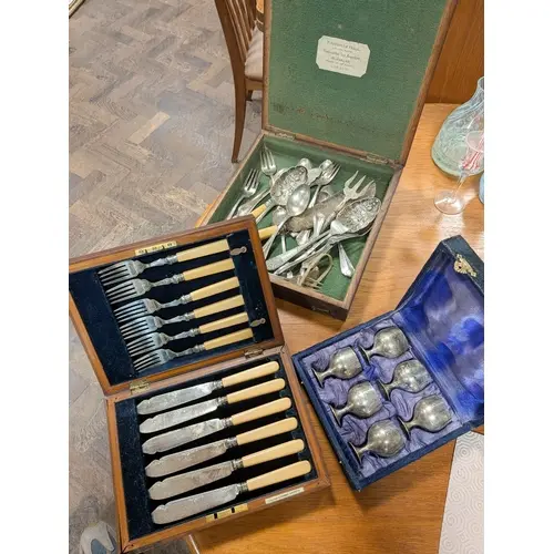 A set of fish knives and forks together with six small pewte...