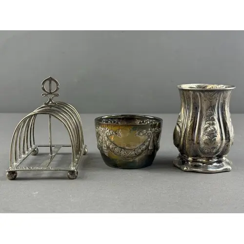 Silver: a six slice toast rack by William Hutton, London 189...