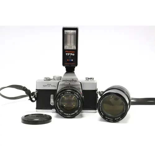Minolta SRT101b 35mm SLR Film Camera with attached MC Rokkor...
