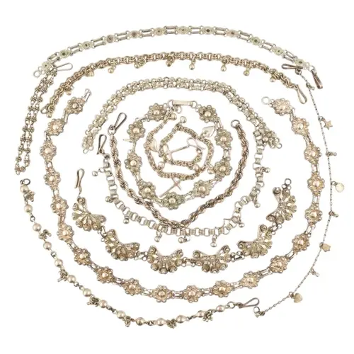 Collection of silver and white metal filigree bracelets and ...