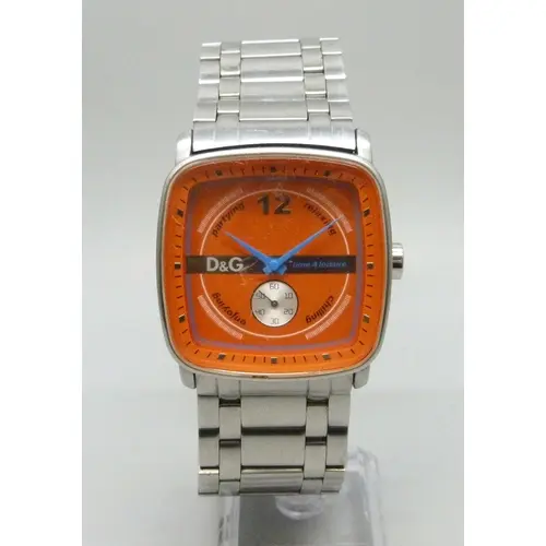 A Dolce & Gabbana orange dial wristwatch with blue hands, 42...