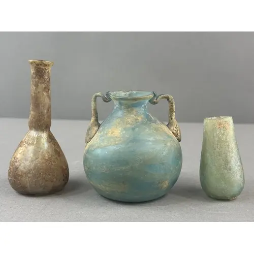 Decorative Arts: a Roman glass bottle of elongated pyriform ...