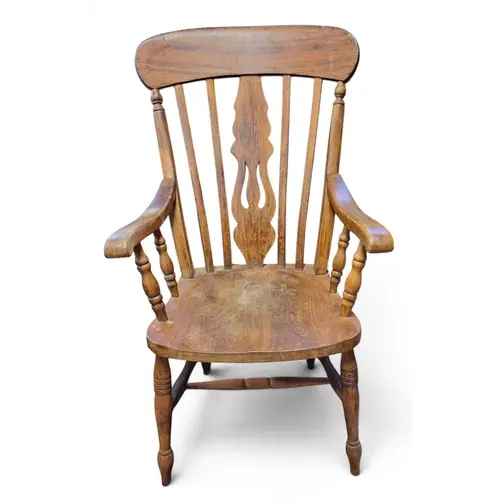 A 19th Century Ash Windsor Armchair on turned supports and s...