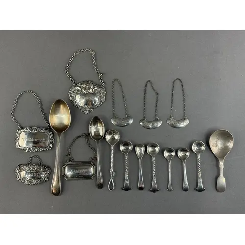 Silver: three kidney shaped decanter labels all marked 'Whis...