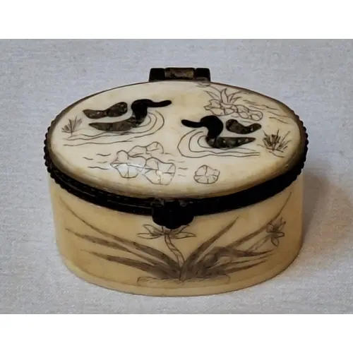 Carved Bone Oval Trinket/pill box with hinged metal frame, s...