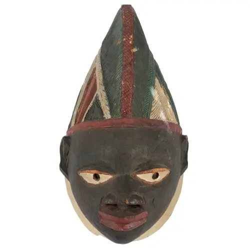 A Yoruba Gelede painted wood mask, Nigeria, 36cm high Prove...