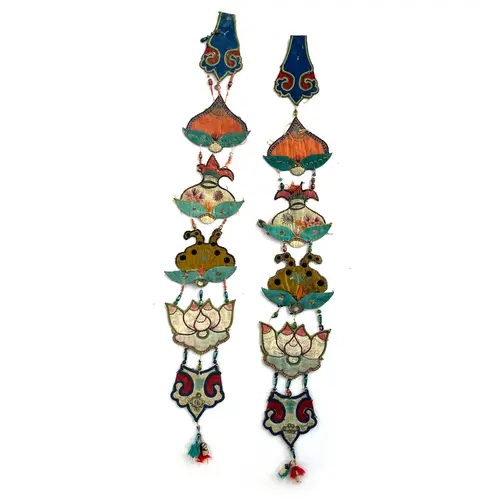 Two antique Chinese wall hangings, each comprised of six sma...