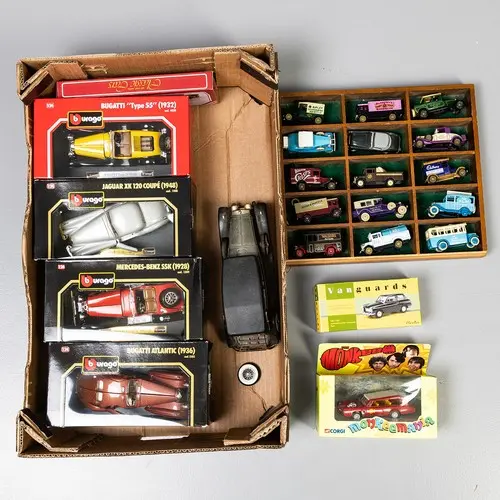 Fruit tray containing diecast model cars to include: Burago ...