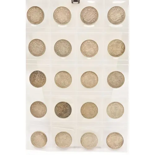 Silver. A page from a coin album containing 20 x King George...