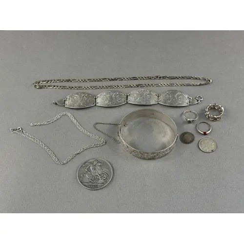 Jewellery: a silver four panel bracelet, Birmingham 1941, en...