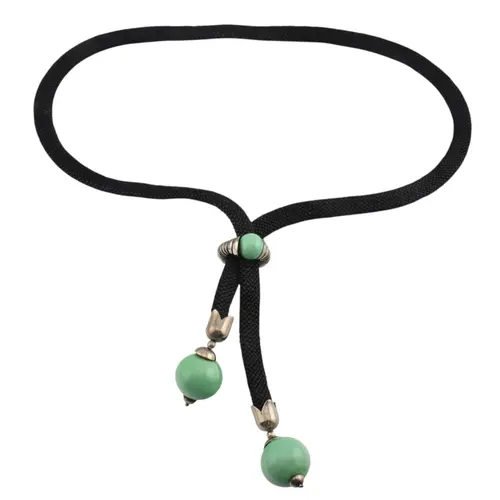 Art Deco black cord and green glass bead lariat necklace. Th...