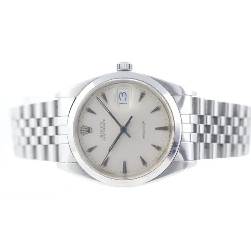 Brand: Rolex Model Name: Oyster Date Precision Reference: 66...
