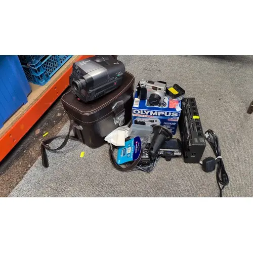 A group of electronics comprising a Sony Hi8 Handycam camcor...