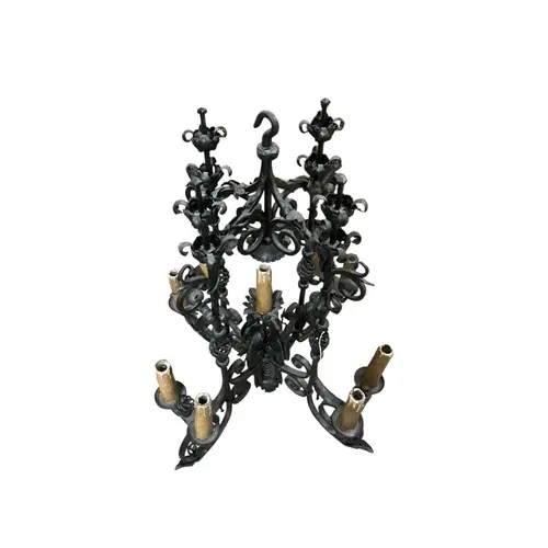 A wrought iron baroque style electrolier, width 53cm, depth ...