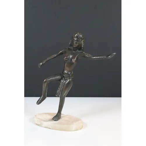 Art Deco style bronzed metal figure of a semi-naked dancer o...