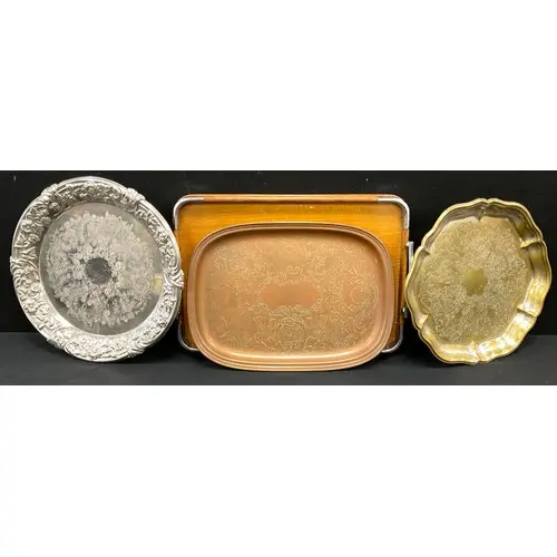 A collection of vintage trays, silver-plated with embossed f...