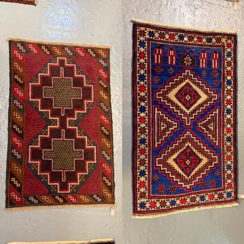 Kazak design hand knotted tribal wool rug with blue field an...