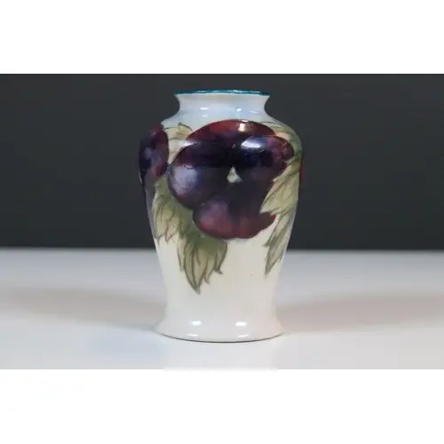 Moorcroft pottery 'Pansy' pattern cream ground vase, designe...