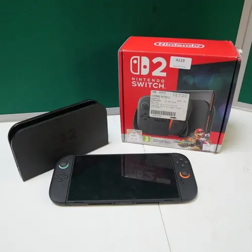 A Nintendo Switch 2 console with docking station and control...
