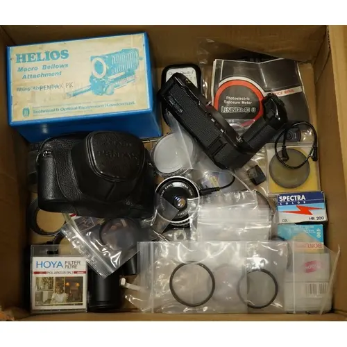 An Asahi Pentax S1a 35mm SLR camera with lens and leather ca...