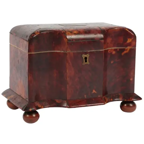 A Victorian tortoiseshell tea caddy, of shaped oblong form, ...