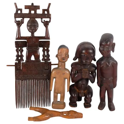 A group of African Tribal wood carvings, including an Ashant...