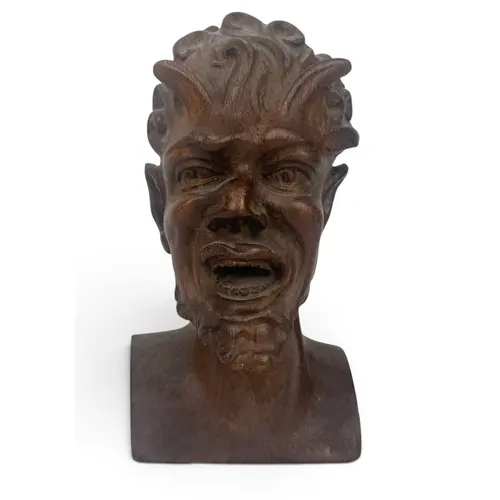 A CARVED WOODN HEAD OF A SATYR 23cm H