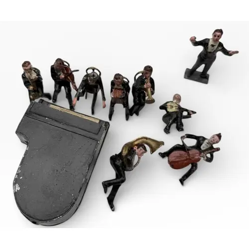 A GROUP OF LEAD MODEL MUSICIANS WITH PIANO