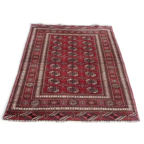 A PERSIAN CARPET 146cm x 123cm