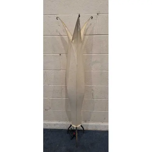 A STANDARD LAMP, with a Jesters hat style top, raised on met...