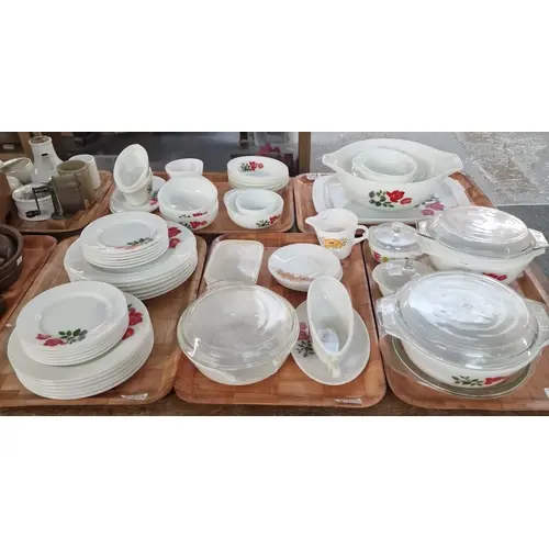 Five trays of Pyrex JAJ ‘June Rose’ milk glass dinnerware an...