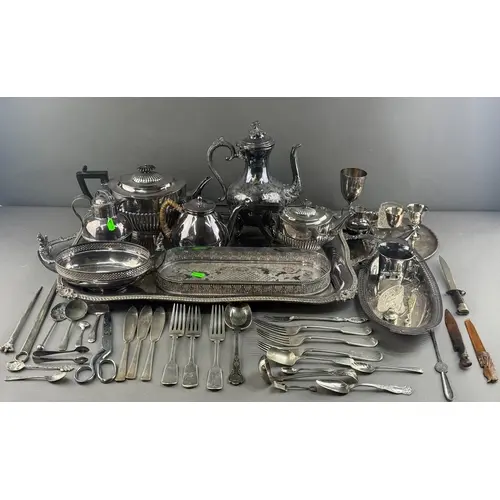 Silver Plate: an engraved two handled tray, 67cm max., a tea...