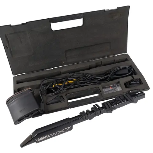 A Yamaha WX7 wind synthesizer, with accessories, cased