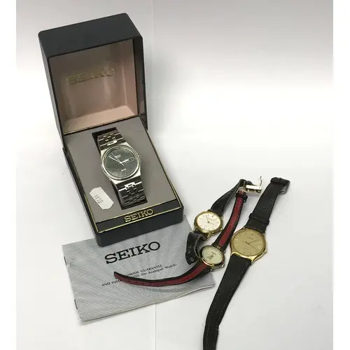 A Seiko Quartz SQ100 black dialled steel bracelet watch c198...