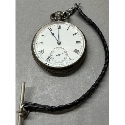 A silver pocket watch hallmarked for Birmingham 1923. Case b...