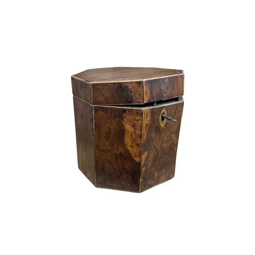 A Regency octagonal burr yew tea caddy, height 12cm.