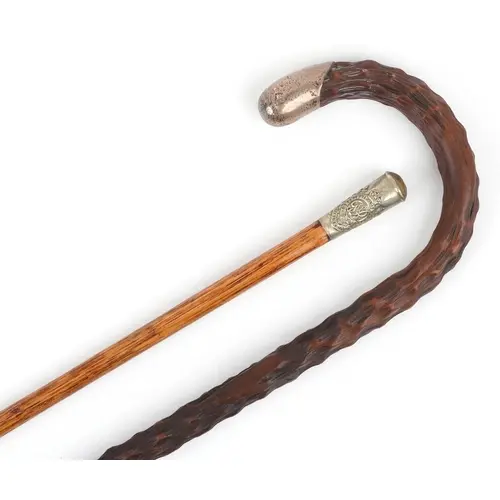 Vintage wooden walking stick with silver mounts and a milita...