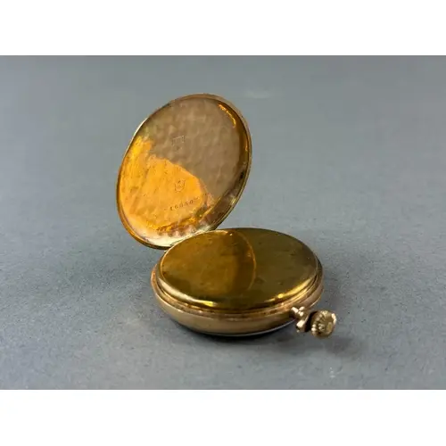 Watches: a yellow metal pocket watch, marked 9c and testing ...
