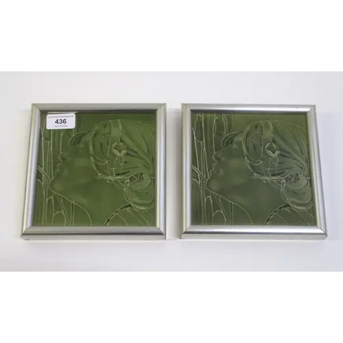 Pair of framed Art Nouveau green glazed tiles, profile of a ...