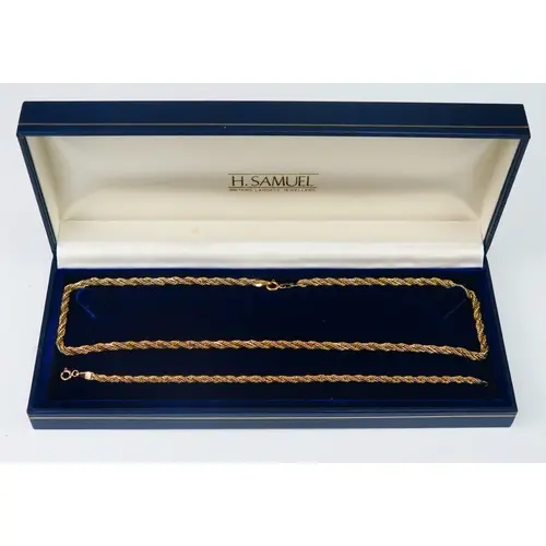 A 9ct yellow gold rope twist and white box link entwined nec...