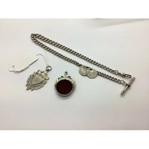 A Hallmarked Silver Curb Link Watch Chain, of graduated desi...