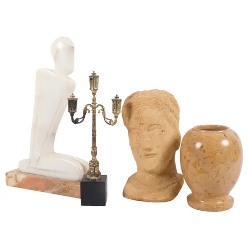 A collection of various interesting items, including a carve...