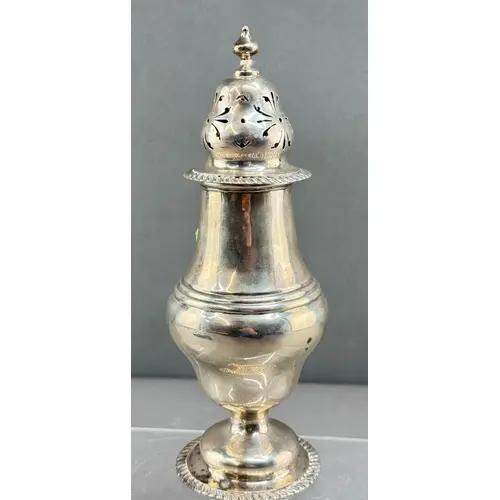 Silver: a pedestal baluster caster by R & S Garrard &amp...