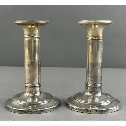 Silver: a pair of simplistic loaded candlesticks by IS Green...