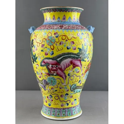 Asian Art: a Chinese Famille Jaune baluster vase decorated w...