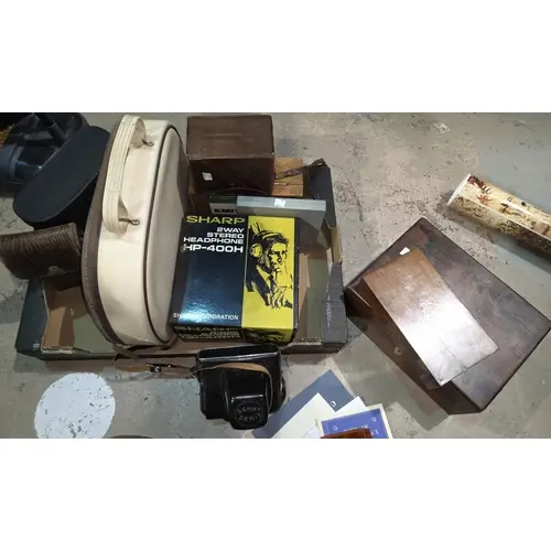 A collection of vintage cameras and similar equipment.