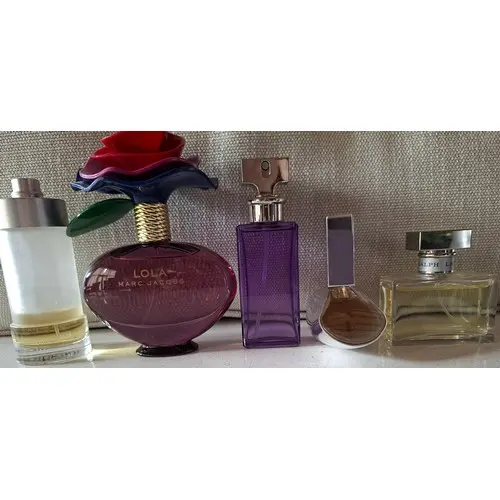Five fragrances comprising Marc Jacobs 'Lola' Eau de Parfum ...