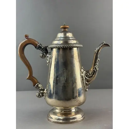 Silver: a George IV coffee pot of tapering form, the handle ...