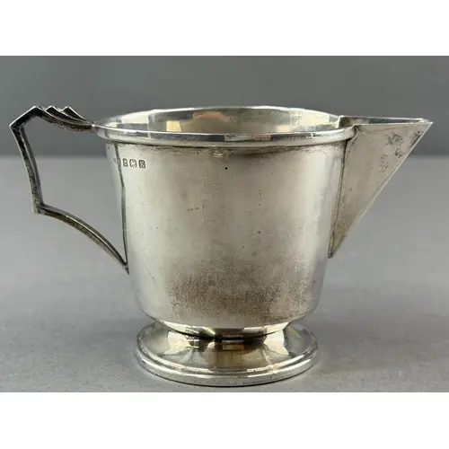 Silver: an Art Deco cream jug by Ernest W Haywood, Birmingha...