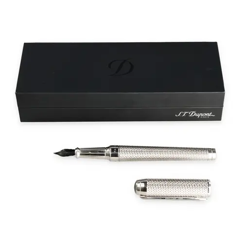 A ST DUPONT PEN IN OPRIGINAL BOX